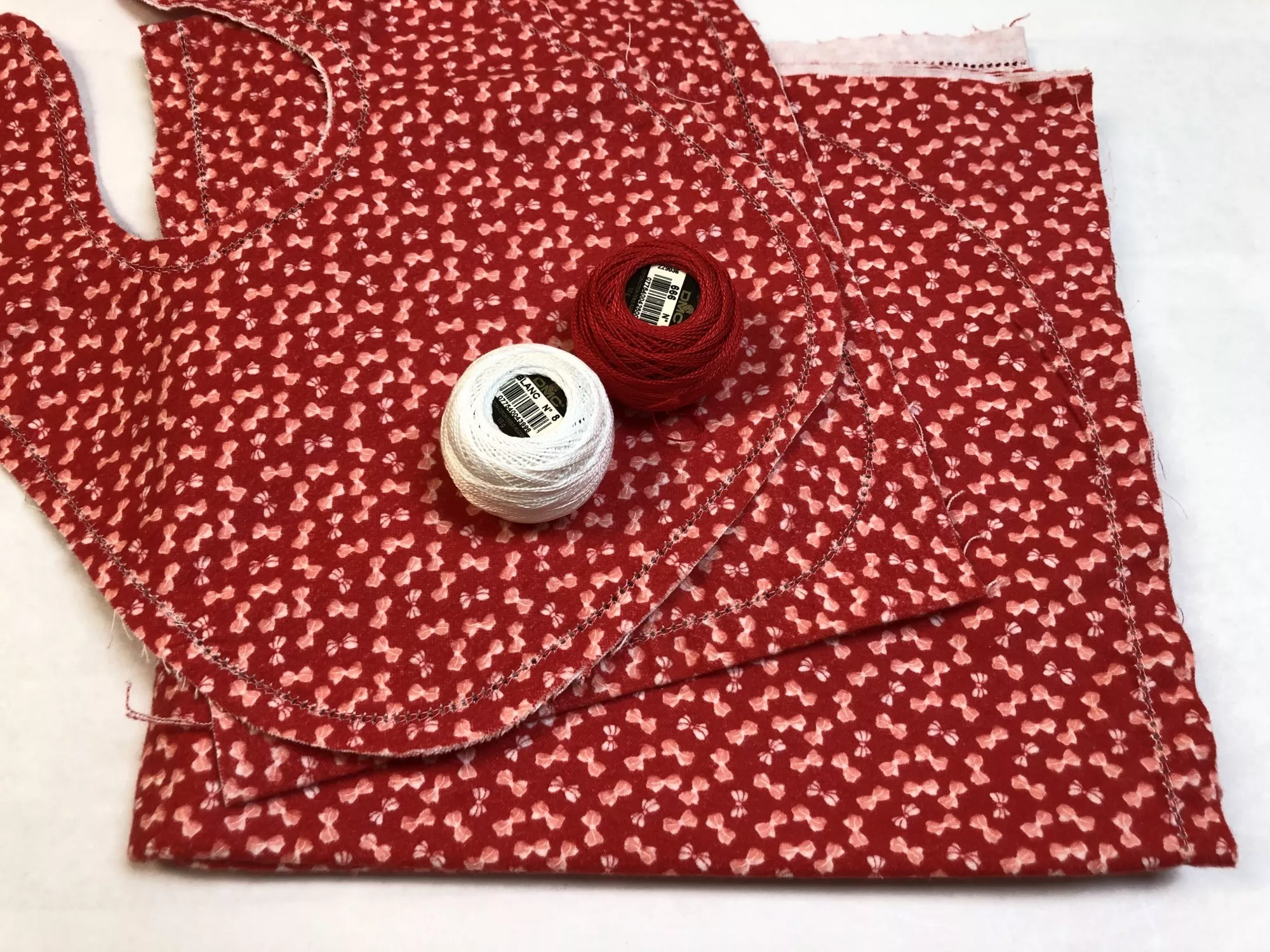Little Ruby Bows on Red Hemstitched Flannel