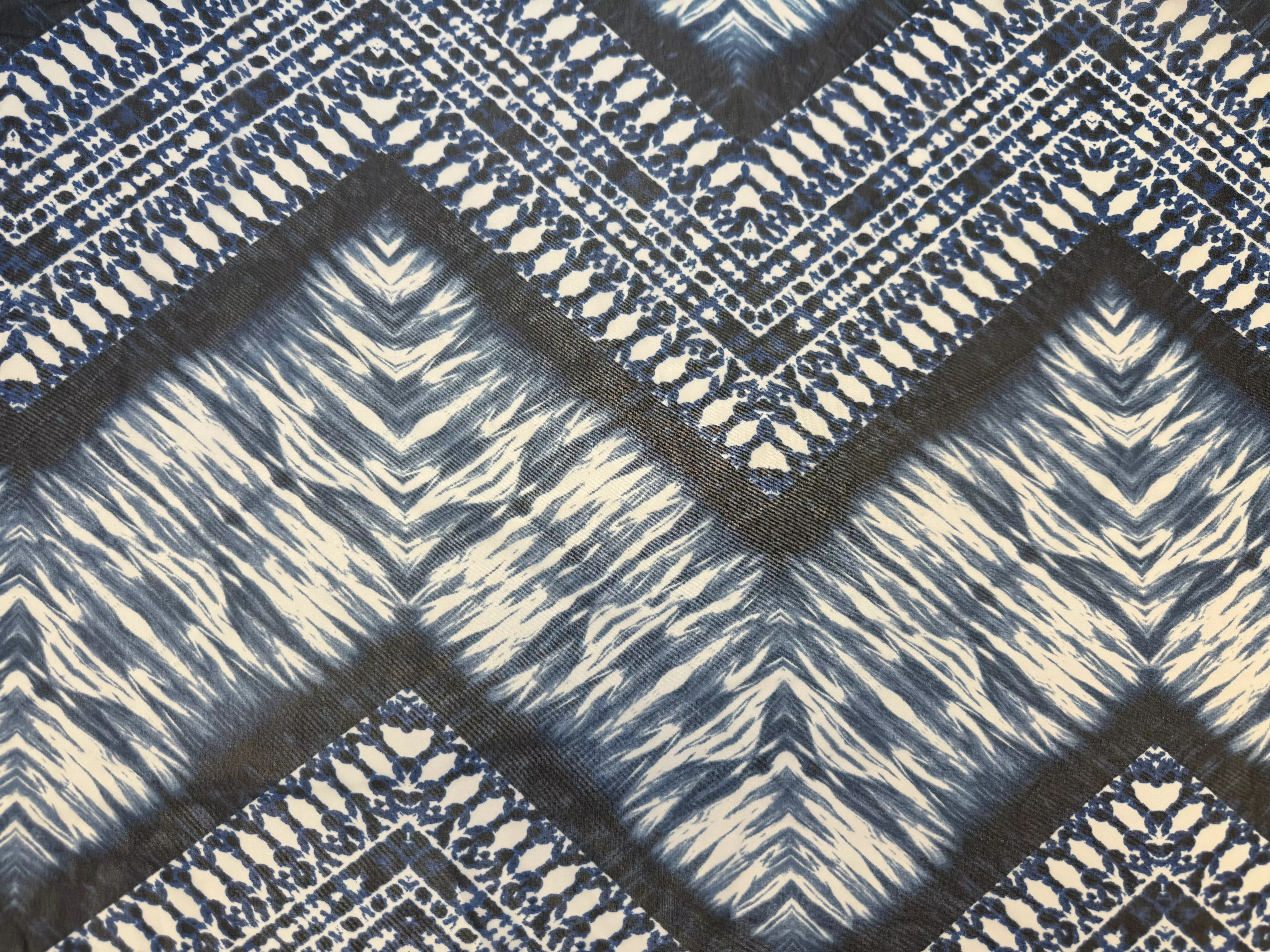 White with blue geometric patterns | Chiffon